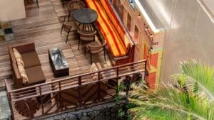 aerial view of seating of paniolo bar and cafe inside equus hotel hawaii